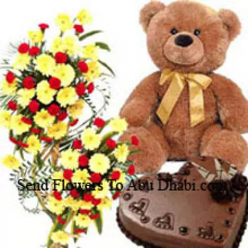 Ein 3 Fuß großes Arrangement von gemischten Blumen, 1 kg herzförmiger Schokoladenkuchen und ein 2 Fuß großer Teddybär (Bitte beachten Sie, dass die Kuchenlieferung nur für die Metro Manila Region verfügbar ist. Alle Kuchenlieferbestellungen außerhalb von Metro Manila werden durch einen Schokoladen-Brownie-Kuchen ohne Sahne ersetzt oder dem Empfänger wird ein Red Ribbon Gutschein angeboten, um denselben Kuchen zu kaufen)